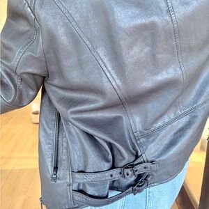 Edgy Black Leather Jacket with Buckle Detail
